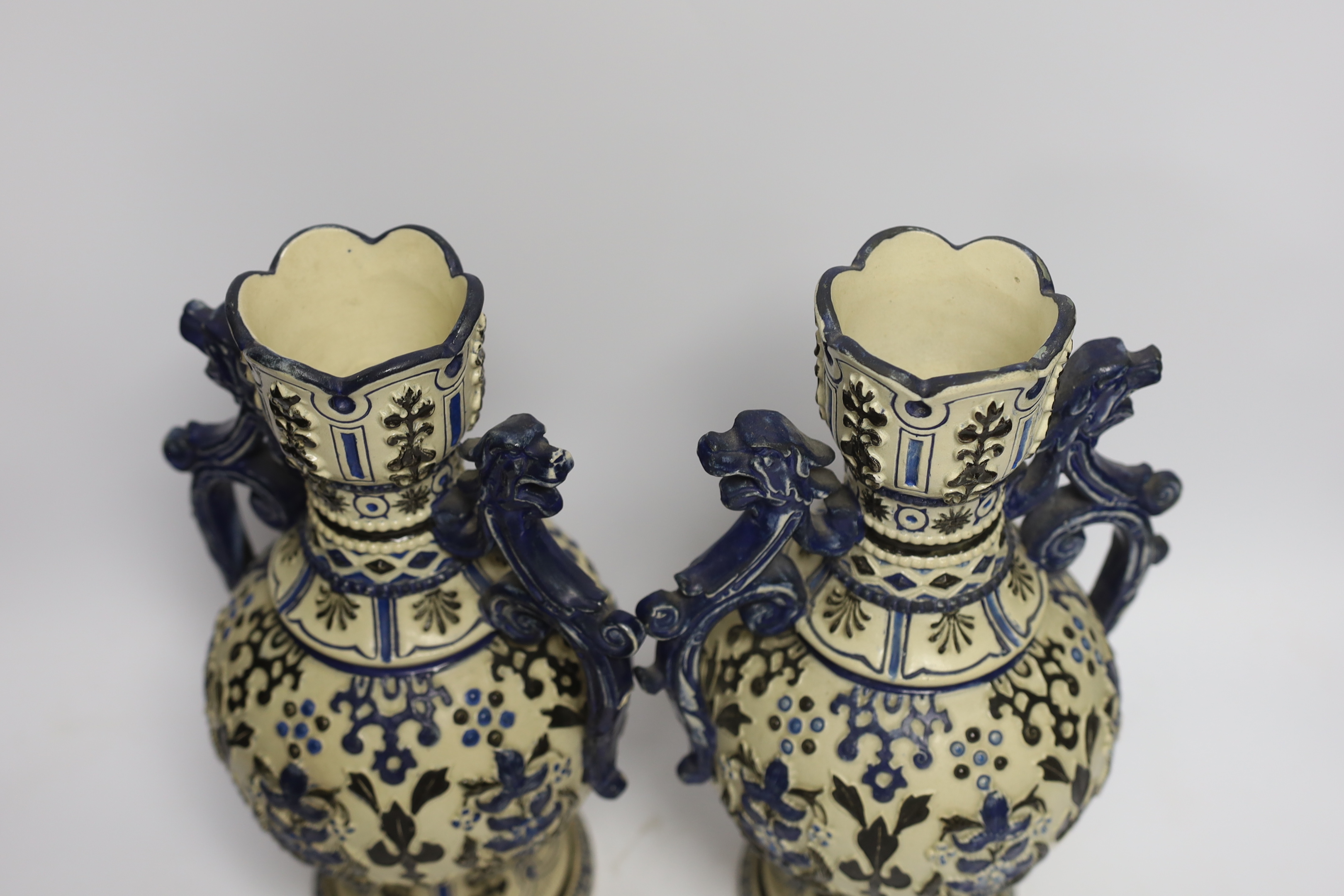 A pair of 20th century German pottery vases, 32cm